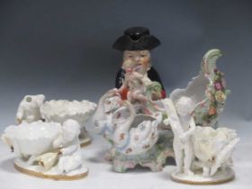 Three Moore bros white glazed figural dishes and a Continental porcelain figural centrepiece; a 19th