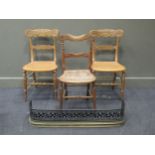 A pair of caned and carved William IV style chairs together with a similar chair and pierced
