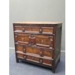 A late 17th / early 18th century oak geometric mitre moulded chest of four long drawers, 89 x 91 x