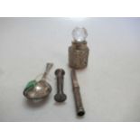A silver Sampson Mordan propelling pencil, a Britannia silver caddy spoon, Birmingham 1811, a silver