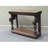 A Victorian carved oak console table with winged caryatid supports, 84 x 116 x 43cm