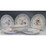 Five Meissen plates with pierced borders and three Continental porcelain cabinet plates, all painted