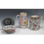 A Famille Rose teapot together with two Imari type bowls and a Poole jug (4)