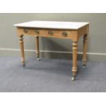 A pine two drawer side table with marble top, 73 x 79 x 55cm