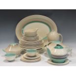 A collection of Susie Cooper wares to include meat plates, cups and saucers, jugs, plates, dessert