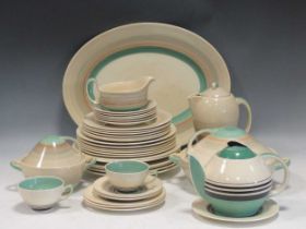 A collection of Susie Cooper wares to include meat plates, cups and saucers, jugs, plates, dessert