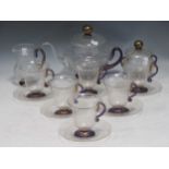 A Murano Glass tea set for six to include a teapot, milk jug, sugar bowl and five cups and