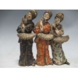 A cold painted metal model of three Geisha girls