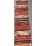 A kilim runner, early 20th century, 340 x 97cmgenerally very good with minimal signs of wear or