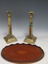 A pair of George III brass telescopic candlesticks and an Edwardian waiter