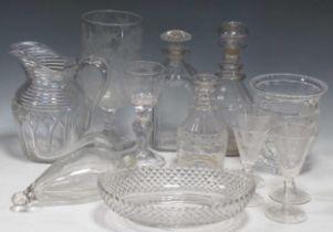 Various cut glass decanters and other glass ware including a bowl, wine glasses, jug and vase