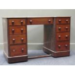 A early 20th century mahogany inverted breakfront kneehole desk, 76 x 121 x 53cm