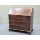 A George III mahogany bureau, with fall front fitted four graduated long drawers on bracket feet,