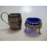 An 18th century silver barrel shaped christening tankard, together with a Dutch silver salt with