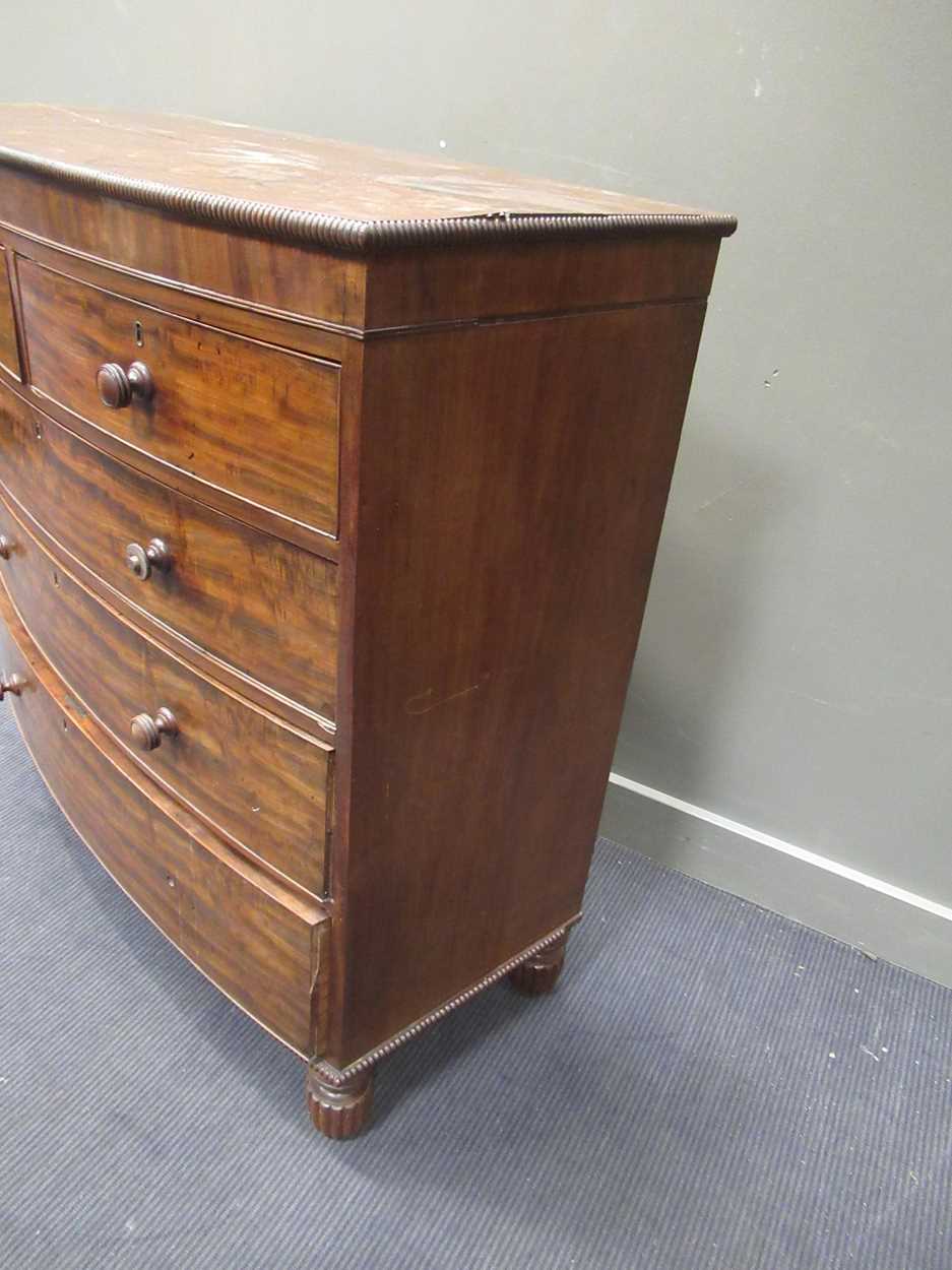 A Victorian bow fronted chest of drawers, with two short over three graduating long drawers, with - Image 8 of 9