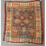 A late 19th century Kazak rug, 130 x 111cmGood pile but some areas of historic moth damage,