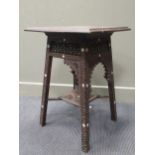 A Moorish carved wood occasional table with mother of pearl inlay, 70 x 49 x 49cm
