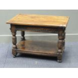A rectangular inlaid oak two-tier table with carved baluster supports, containing 17th century
