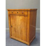 A Biedermeier pedestal cupboard with one long drawer over a single cupboard, 91 x 71 x 46cm