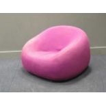 A mushroom chair with pink upholstery, FOAM
