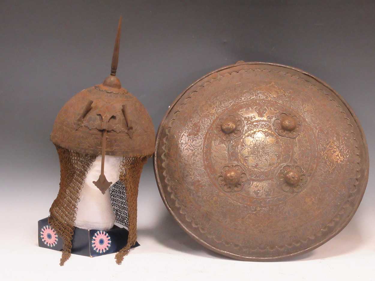 An Indian Kulah Khud top helmet together with a shield, probably 19th century, decorated with