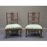 A pair of Edwardian mahogany bedroom chairs, with pierced vase splat (2)
