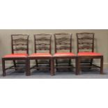 A set of four George III style mahogany dining chairs with drop in seats (4)