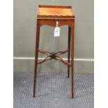 A mahogany urn stand, early 19th century, the square top with wavy gallery above a single slide