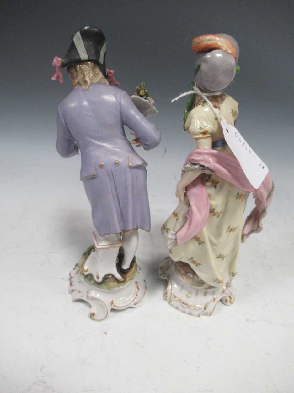 A pair of Dresden type porcelain figures of a gallant and his lady companion, probably Volkstedt, - Image 5 of 23