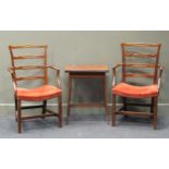 A pair of George III style mahogany ladder back chairs together with an Edwardian fold over card