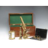 A brass microscope by Wood, and a basic microscope, scientific scales & a French carriage clock.