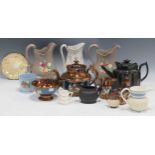 A collection of ceramic wares to include an 18th century teapot and black basaltware cream jug,