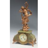 An Art Nouveau onyx based figural gilt metal mantle clock