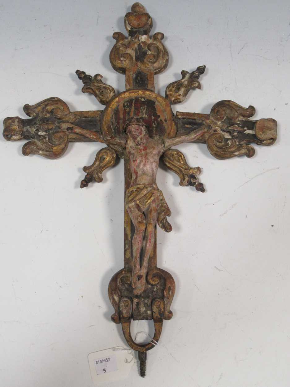 An Italianate painted wooden form of the crucifixion, 45 x 22.5cm