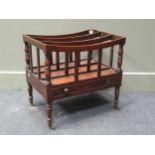 A George III mahogany canterbury with intricately turned legs, 48 x 50 x 35cm