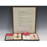 A cased CBE (Commander of the Order of the British Empire) and accompanying miniature and