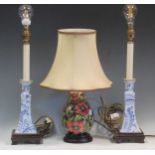 A mid-20th century Moorcroft table lamp together with two blue and white ceramic table lamps (3)