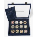 HM The Queen's Diamond Jubilee 2012 set of 12 gold plated portrait medallions by Westminster, cased;