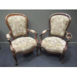 Two Victorian showframe easy armchairs (2)