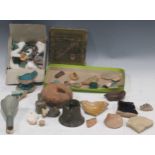 A group of archaeological fragments to include a broken Roman glass vase, kashan pottery etc