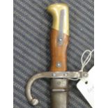 An Usine de Steyer bayonet, 1886, with scabbard, 23.5"; together with another Usine de Steyer
