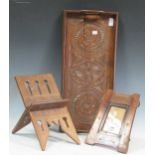 A chip carved tray (cracked), a small carved Koran stand, and Art Nouveau easel back photo frame