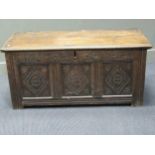 A 19th century oak carved panelled coffer, 56 x 119 x 50cm