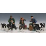 A set of three Beswick models of Friesian cows; three Royal Doulton models, A Good Catch, The