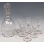 A glass tipple necked decanter and six glasses