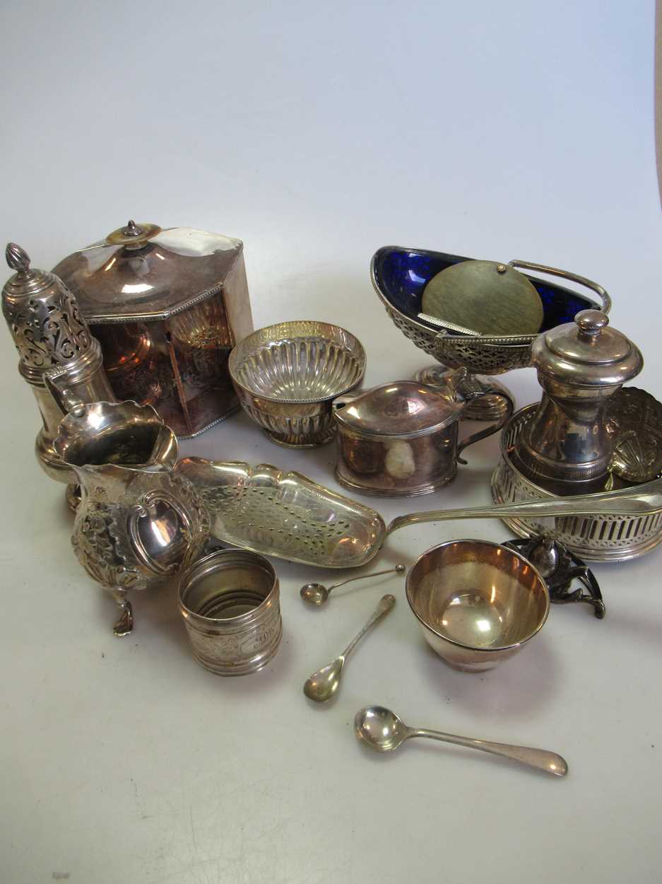 A Danish silver fish slice, a Dutch silver caddy spoon an 18th century silver cream jug, a silver