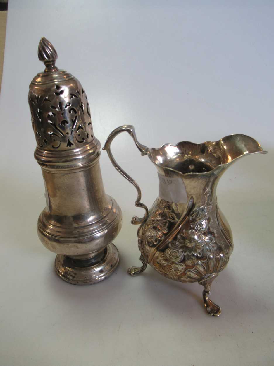 A Danish silver fish slice, a Dutch silver caddy spoon an 18th century silver cream jug, a silver - Image 2 of 5