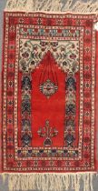 Two 20th century prayer rugs, with a Belouchi mat, largest measuring 135 x 93cm
