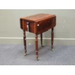 A late Regency flame mahogany drop flap work table open facetted legs and casters, 71 x 37 x 53cm (