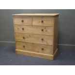 A pine chest of two short over three long drawers, 105 x 107 x 50cm